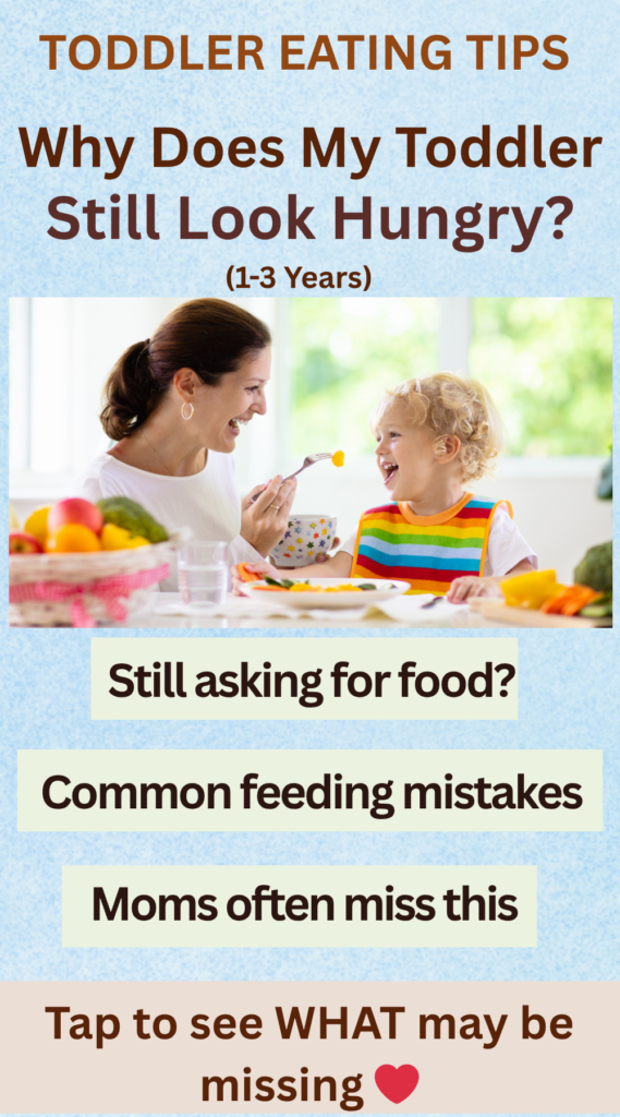 Why Your Toddler Still Looks Hungry Even After Eating (1–3 Years) Mom feeding a toddler during mealtime with toddler eating tips about why some toddlers still look hungry even after eating.