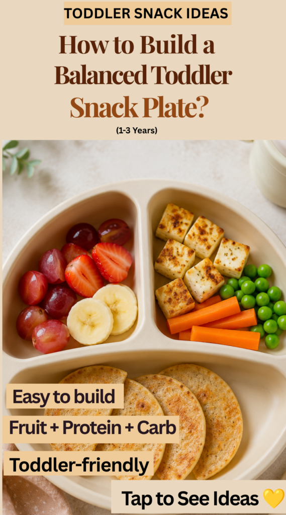 Balanced toddler snack plate featuring fruit, protein, and carbohydrate foods arranged in a divided plate for toddlers aged 1–3 years.