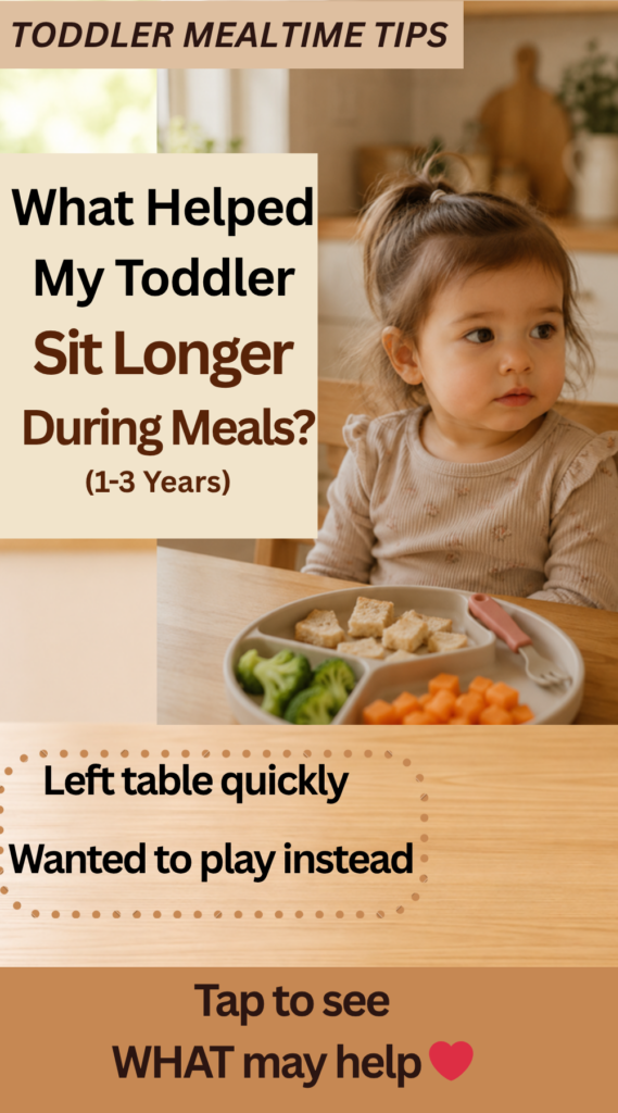 Toddler sitting at dining table with simple meal on divided plate in warm kitchen setting with text overlay “What Helped My Toddler Sit Longer During Meals?”