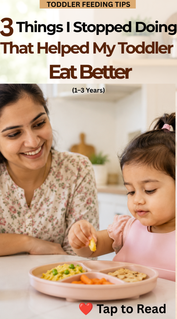 3 Things I Stopped Doing That Helped My Toddler Eat Better (1–3 Years) Parent smiling while watching a toddler happily eat independently at the table, illustrating simple mealtime habits that encourage better eating.